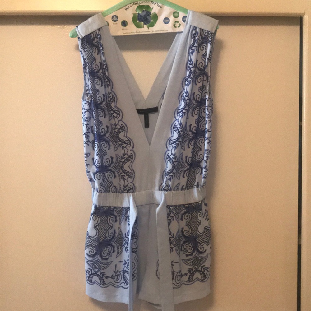 New (just dry cleaned) worn once. BCBG romper.